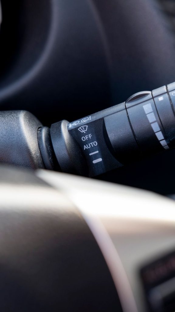 Mastering the First Impression: Your intriguing post title goes here Detailed view of a car's wiper control switch, showcasing automotive design.